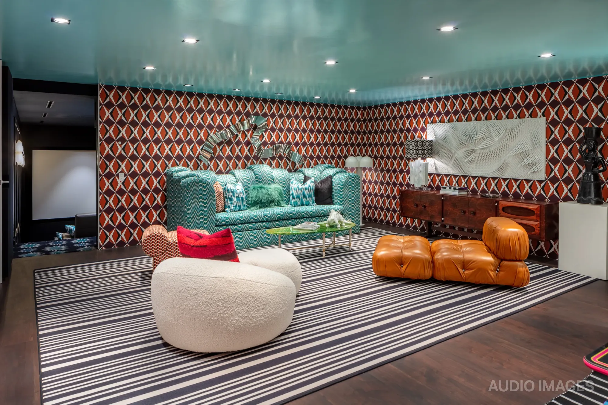 A designer-led residential interior showing integrated AV elements coordinated with the architecture