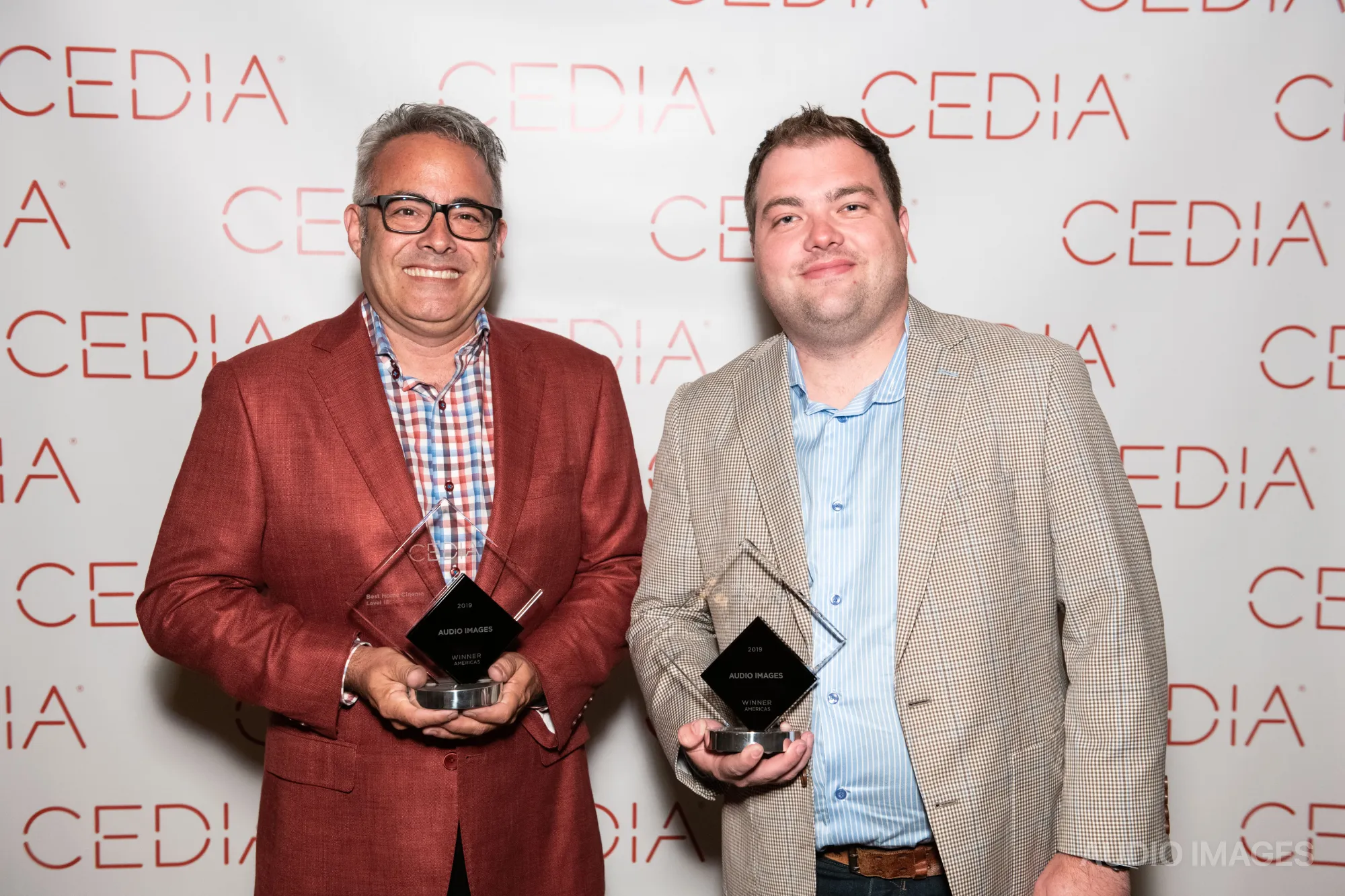 Audio Images team accepting a CEDIA award