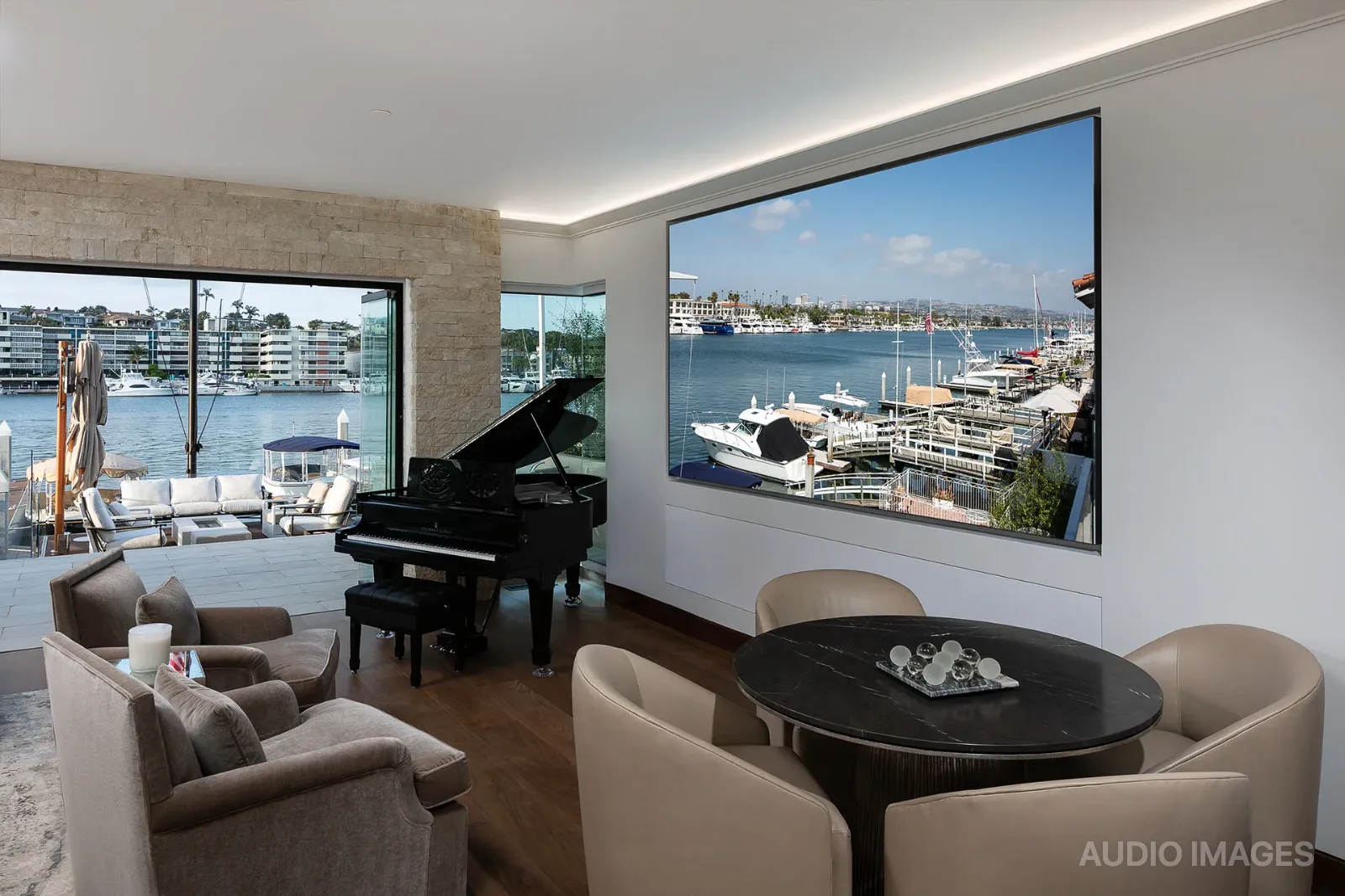 A refined luxury living space with technology seamlessly integrated into the architecture