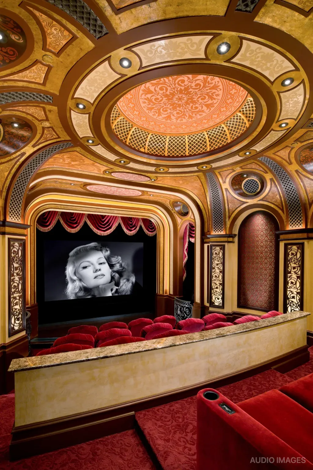 Cinema Paradiso — classic film projected on screen beneath the ornate gilded ceiling.