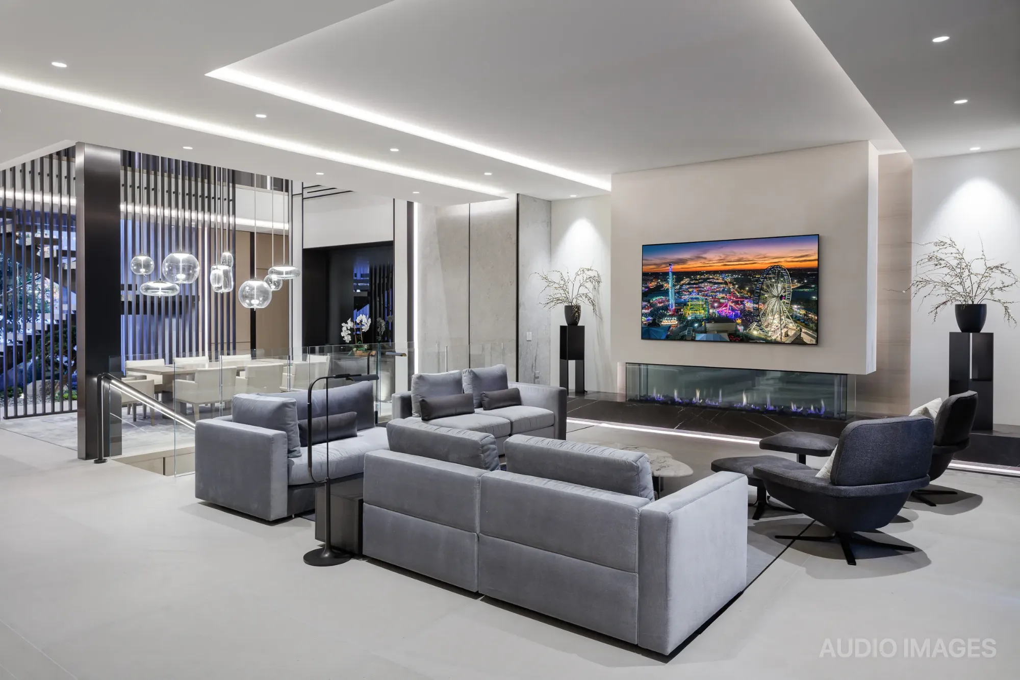A luxury living space designed by Audio Images where technology disappears into the architecture
