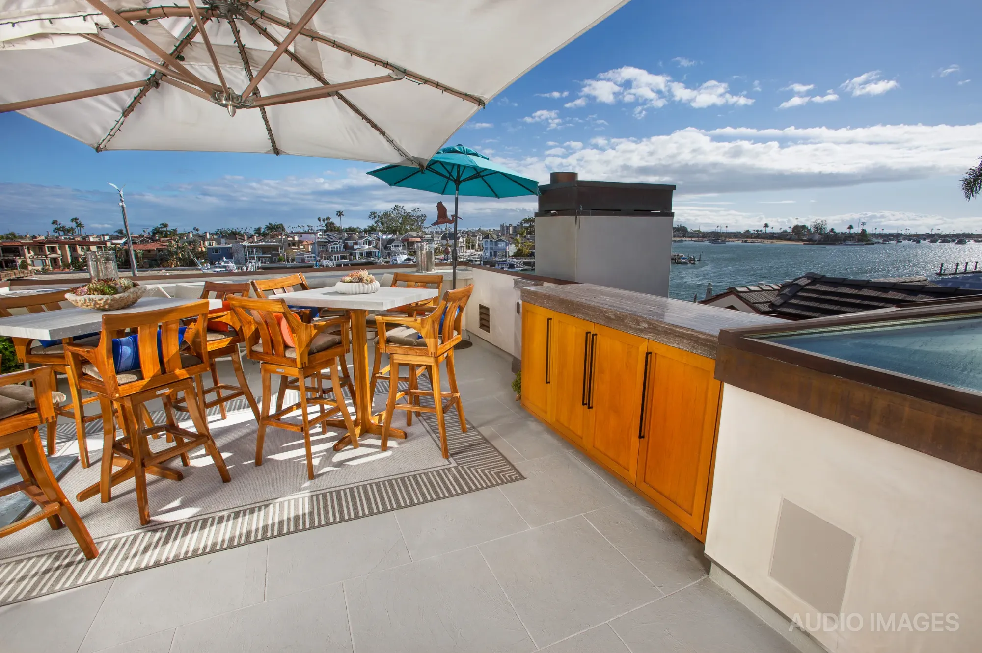 The rooftop bar and dining deck with the outdoor display fully concealed.